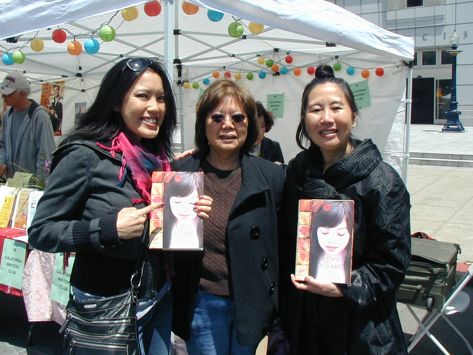 Jennifer & her mom Susan at Asian Heritage Street Celebration tell Teresa LeYung Ryan that they had read Love Made of Heart