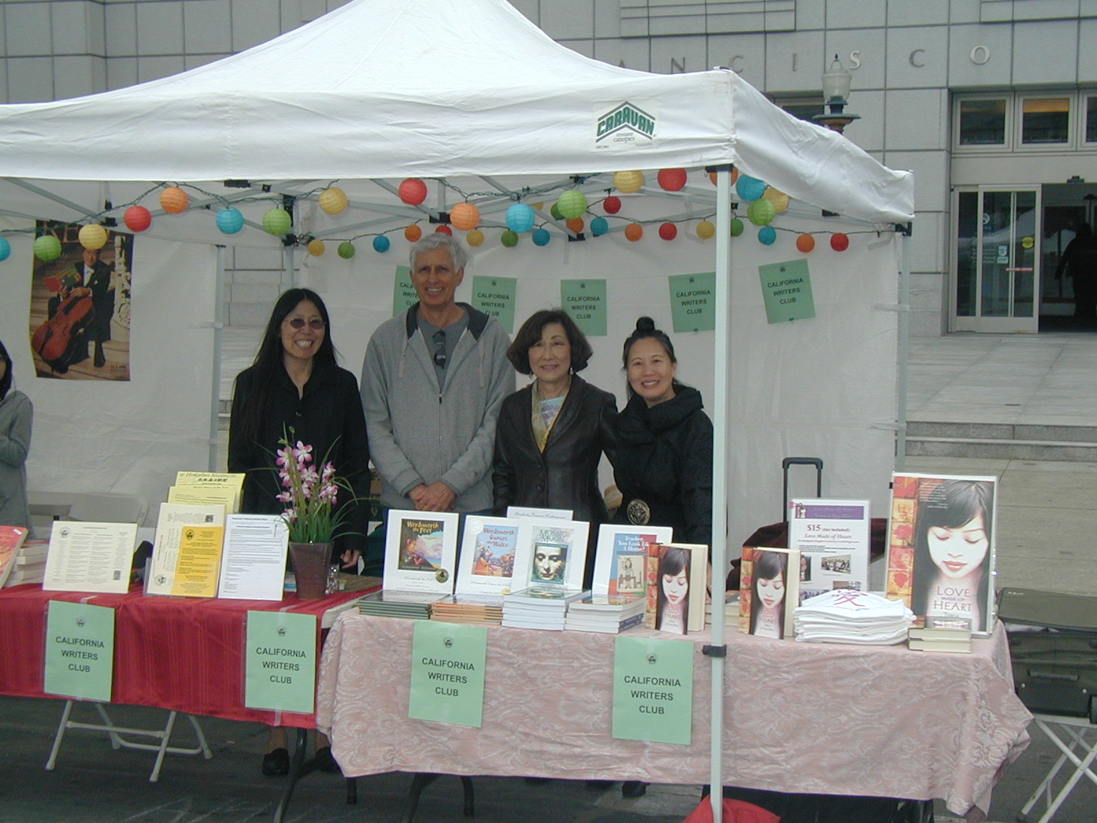 Margie Yee Webb, Lloyd Lofthouse, Frances Kakugawa, Teresa LeYung Ryan sign books at Asian Heritage Street Celebration